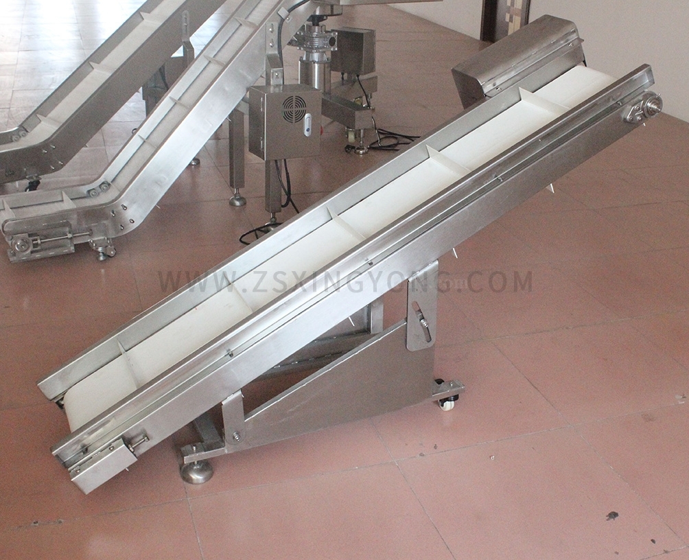 Inclined finished product conveyor